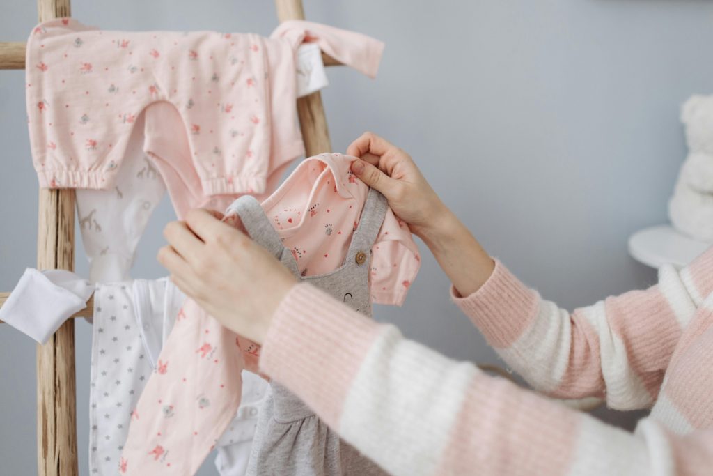 Nesting Mom selecting clothes