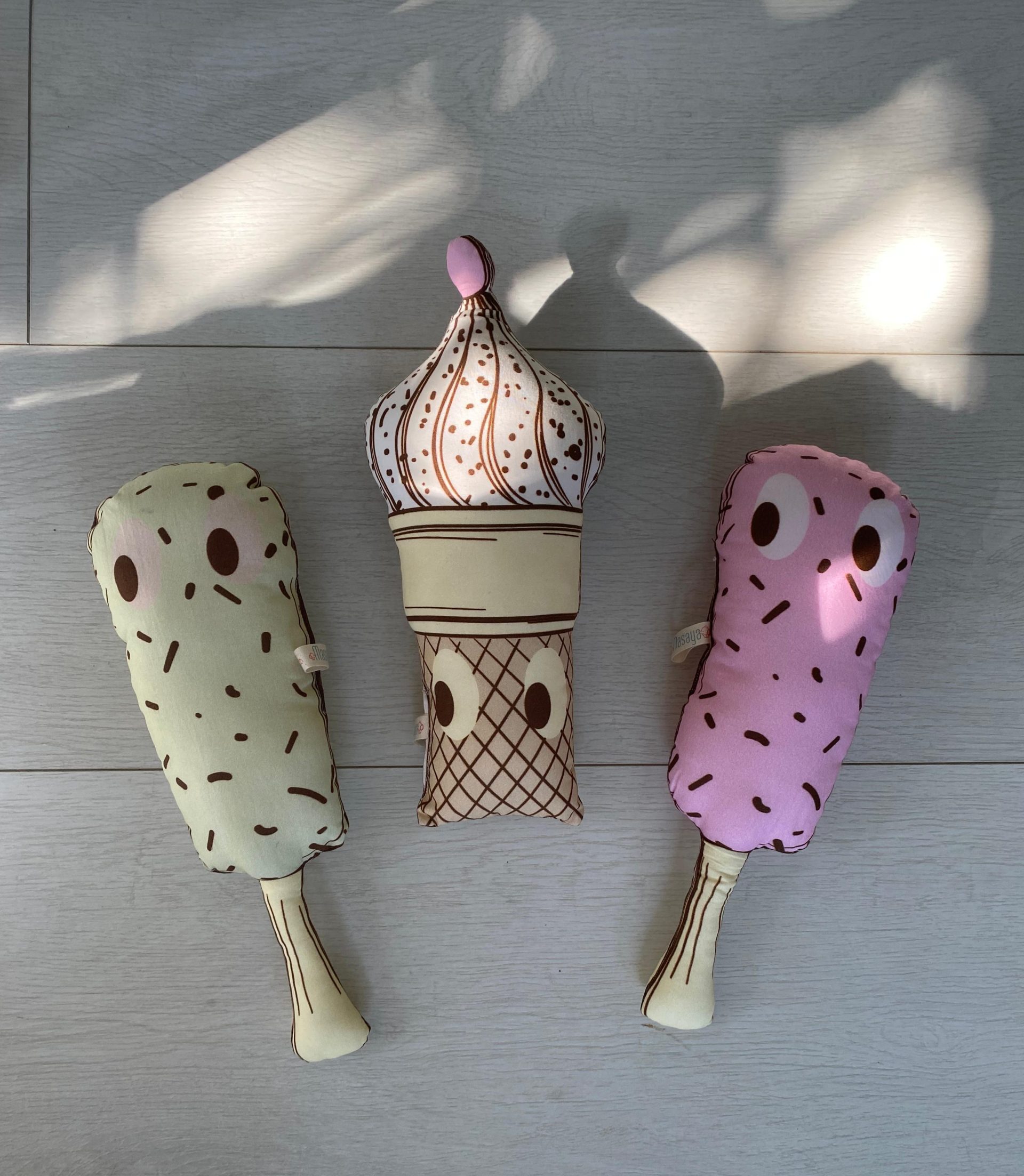 Ice Cream Stick cushion in soft green hue